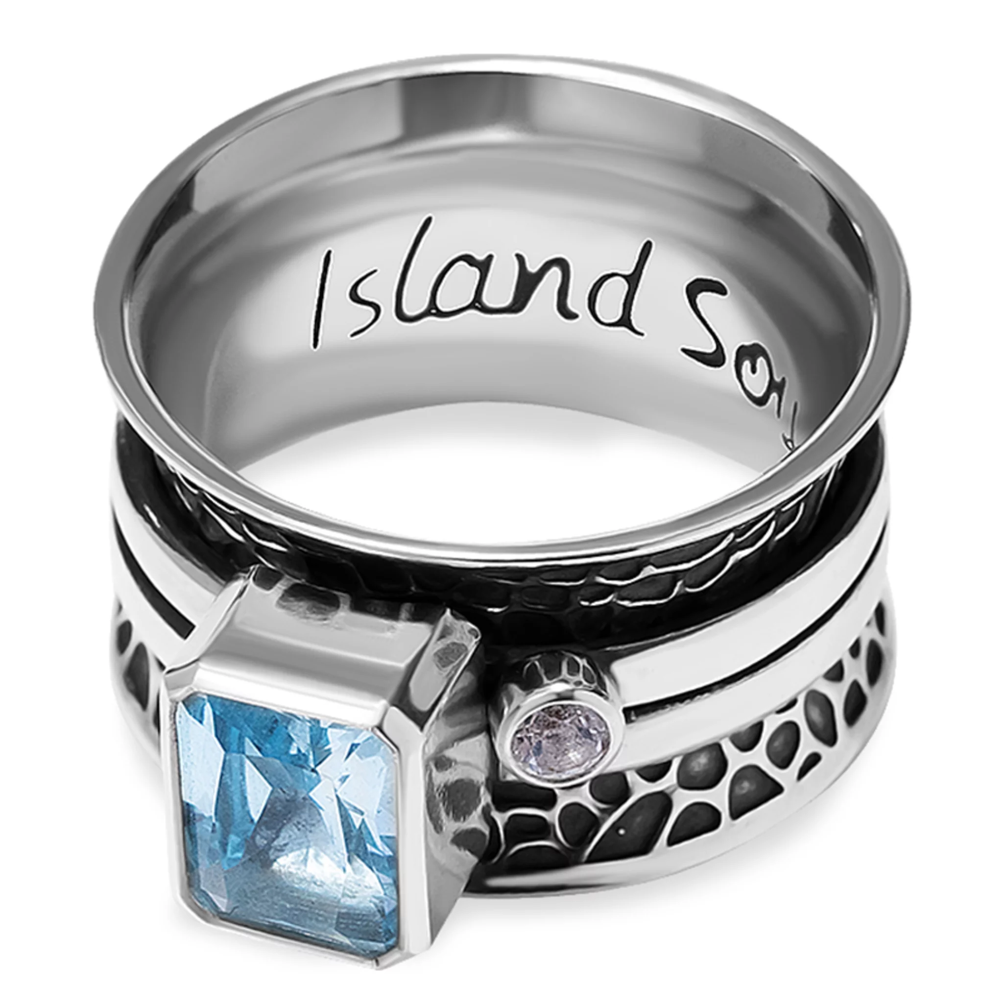 03-00-0262 Кольцо-механизм рустик с прямоугольным голубым и белым топазами (фасет) (Ag 925)-1