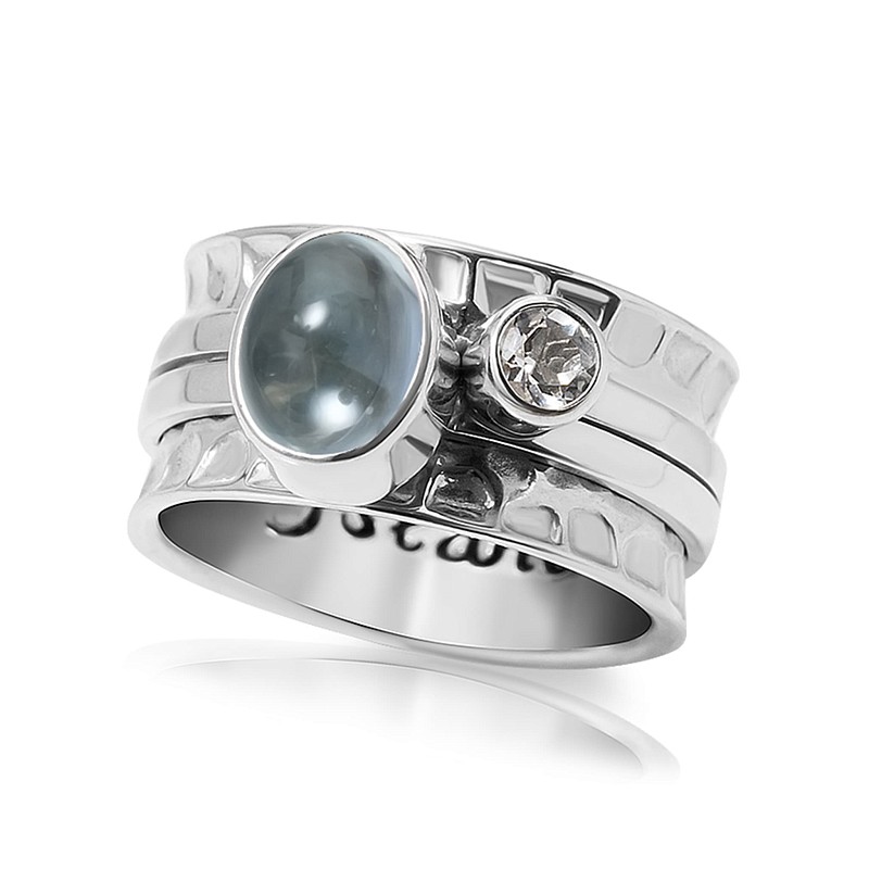 03-00-0429 Кольцо-механизм с овальным топазом Sky (кабошон) и круглым белым топазом (Ag 925)