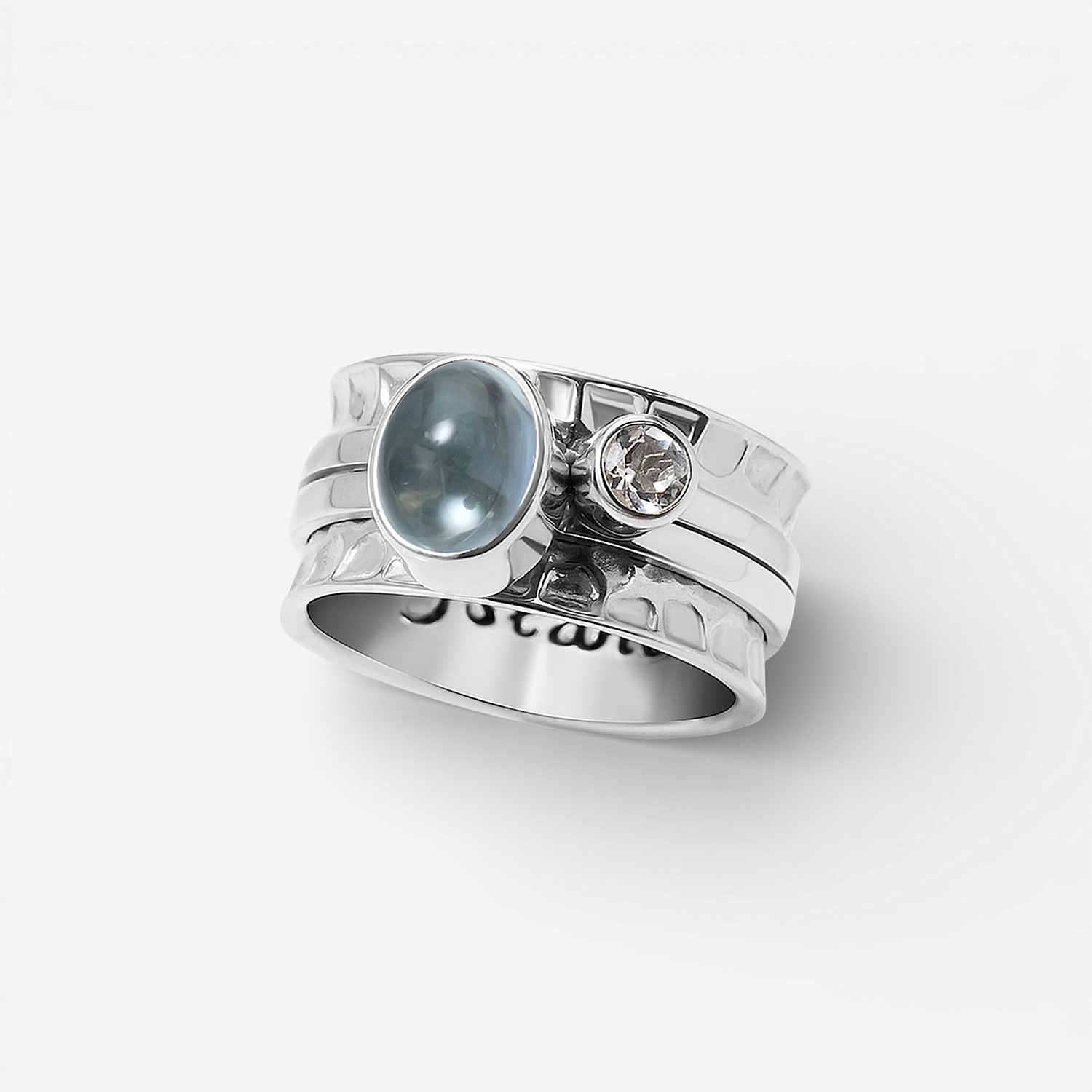 03-00-0429 Кольцо-механизм с овальным топазом Sky (кабошон) и круглым белым топазом (Ag 925)-1